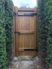 Idigbo village design single gate in mid oak finish rear