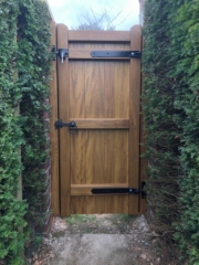 idigbo village design single gate in mid oak finish rear