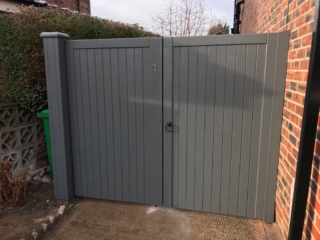 village design driveway gates in grey finish