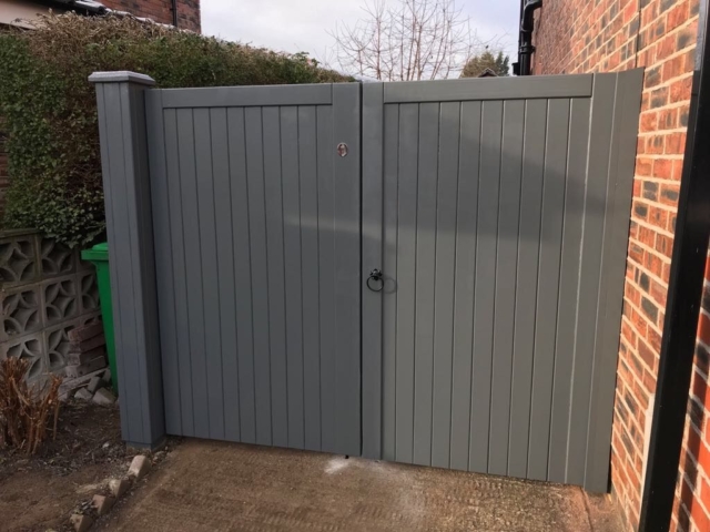 Village design driveway gates in grey finish