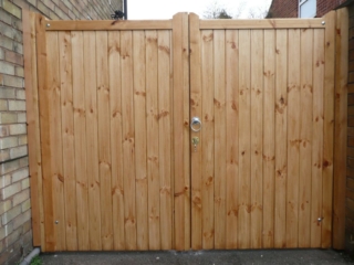 double wooden side gates