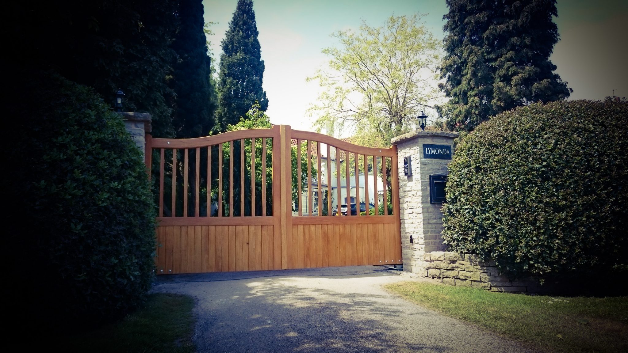 Hardwood driveway gates Heaton design in light oak