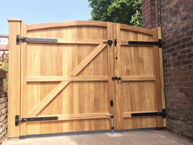 Iroko hardwood assymetrical gates in natural finish